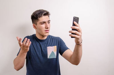 Young man using mobile phone