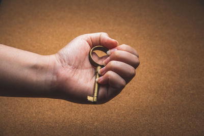 Close-up of hand holding hands