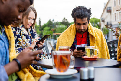 Young man using mobile phone