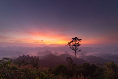 Scenic view of mountains against sky during sunset