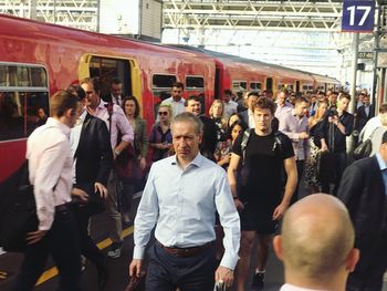 Group of people standing on train