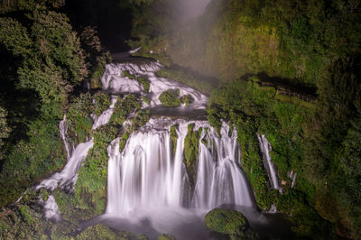 View of waterfall in forest