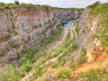 High angle view of water flowing through rocks