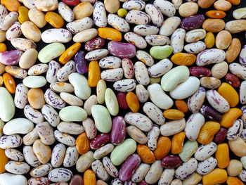 High angle full frame shot of multicolored kidney beans for sale in market
