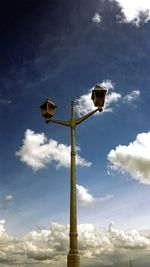 Low angle view of street light against sky