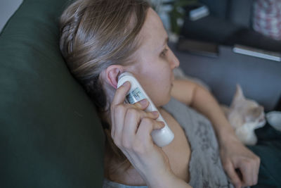 Woman checking temperature