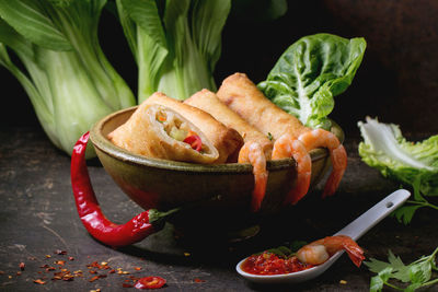 High angle view of spring rolls served in plate