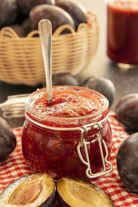 Close-up of ice cream in jar on table