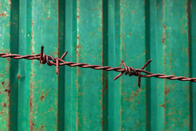 Close-up of barbed wire fence