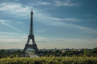 Tower against cloudy sky