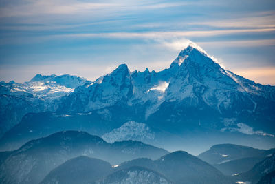 Scenic view of snowcapped mountains against sky