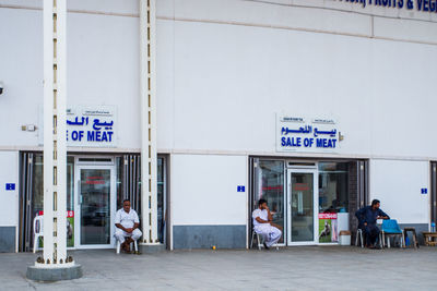 People at entrance of building