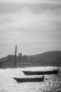 Sailboat on sea against sky