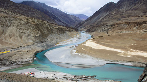 Panoramic view of lake and mountains against sky