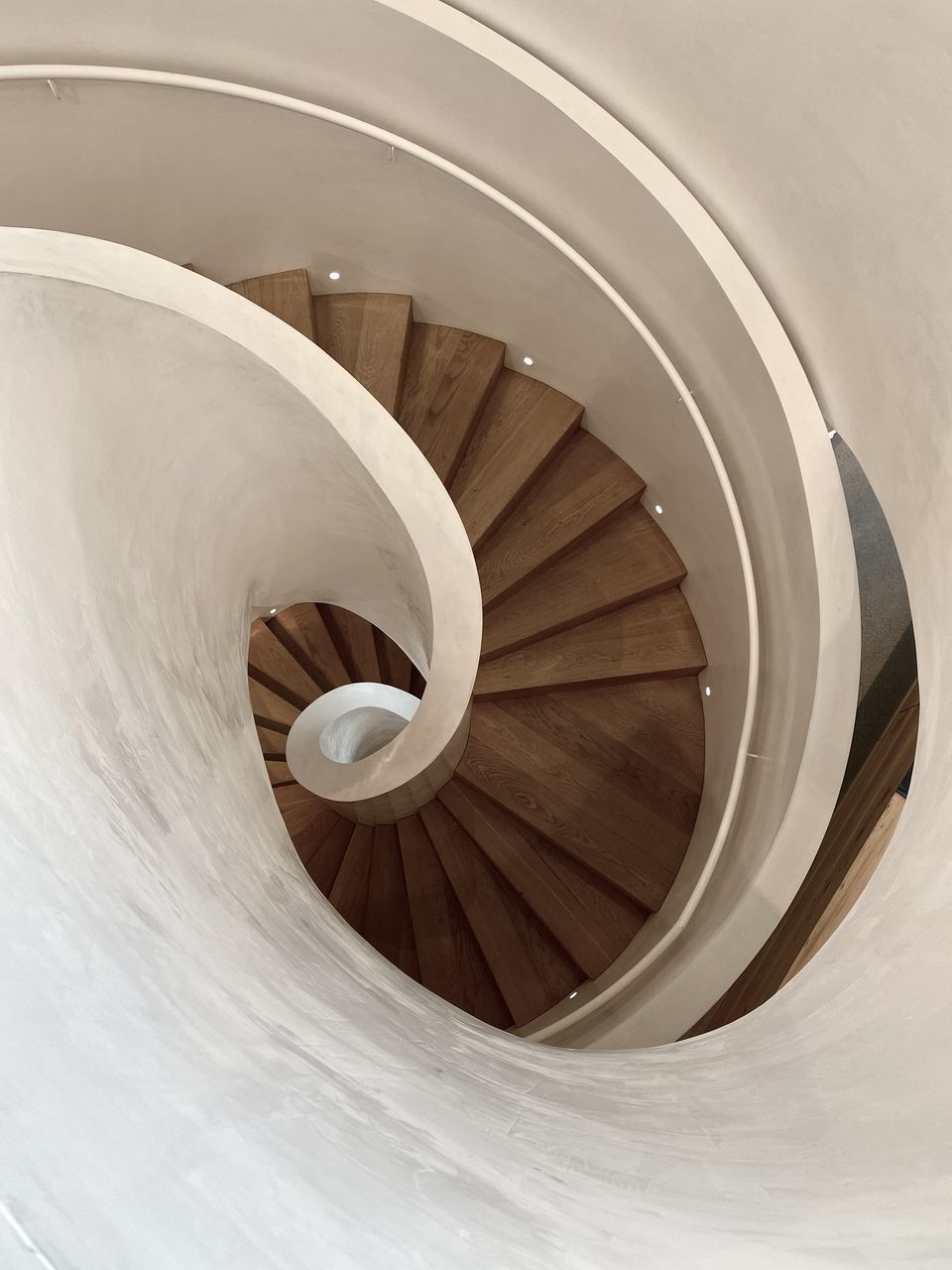 DIRECTLY ABOVE VIEW OF SPIRAL STAIRCASE