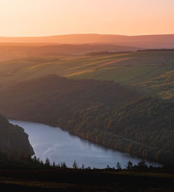 Scenic view of landscape against sky during sunset