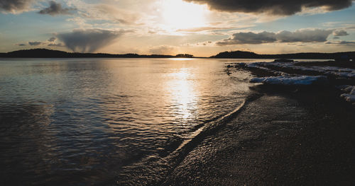 Scenic view of sea against sky during sunset