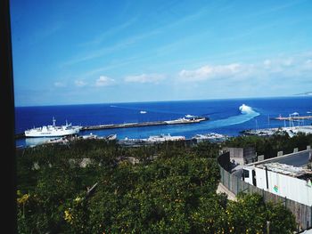 Scenic view of sea against blue sky