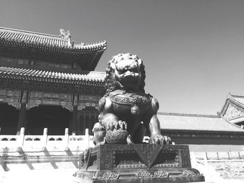 Low angle view of sculpture at tiananmen square against clear sky