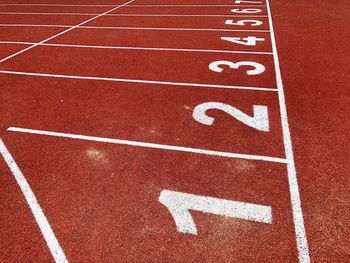 High angle view of numbers on sports track