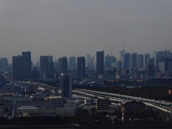 High angle view of buildings in city against sky