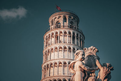 Low angle view of statue against sky