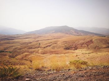 Scenic view of mountains against clear sky