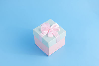Close-up of gift box on blue background