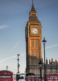 Low angle view of clock tower against sky
