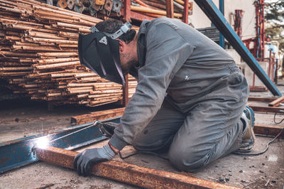 Man working on metal