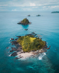 Aerial view of island against sky