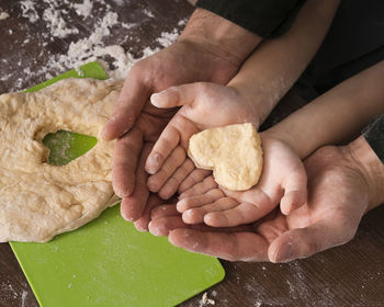 Cropped hands of person preparing food