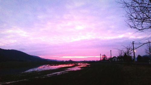 Scenic view of landscape at sunset