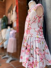 Close-up of clothes hanging on display at store