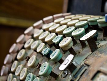 Close-up of various objects on rusty metal