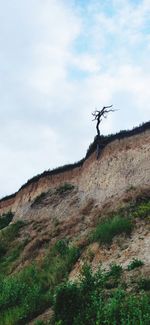 Low angle view of land against sky