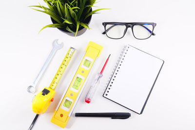 Close-up of eyeglasses against white background