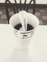 Close-up of coffee cup on table