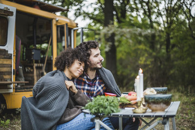 Young man and woman having food