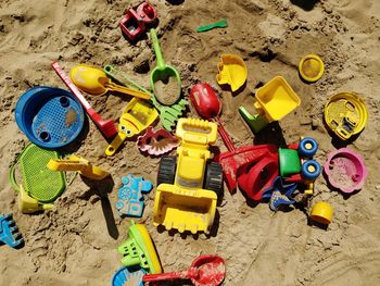 High angle view of toys on beach