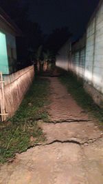 Footpath amidst buildings