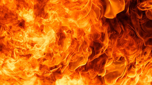 Close-up of fire against black background