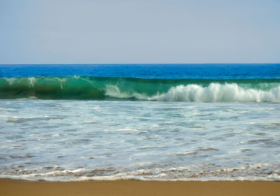 Scenic view of sea against clear sky