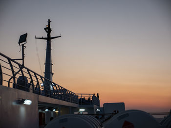 Low angle view of silhouette bridge against sky during sunset