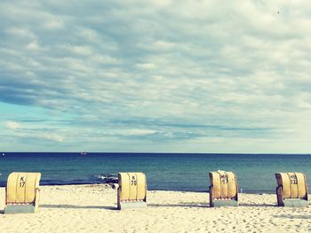 View of calm beach against the sky