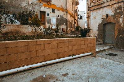 View of alley amidst buildings