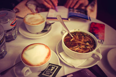 Close-up of coffee cup on table