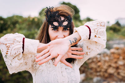 Portrait of woman with eyewear against sky