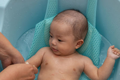 Cute baby boy in bathtub