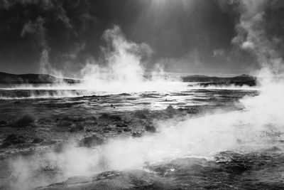 Panoramic view of sea against storm clouds